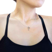 Cross with angel wings necklace UK