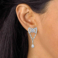Silver bow tie earrings UK