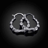 Sterling Silver Hoops - Sterling Silver Curved Abstract Hoops UK