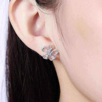 Stud Earrings - Sterling Silver Hollow Floral Petal Stud Earring UK